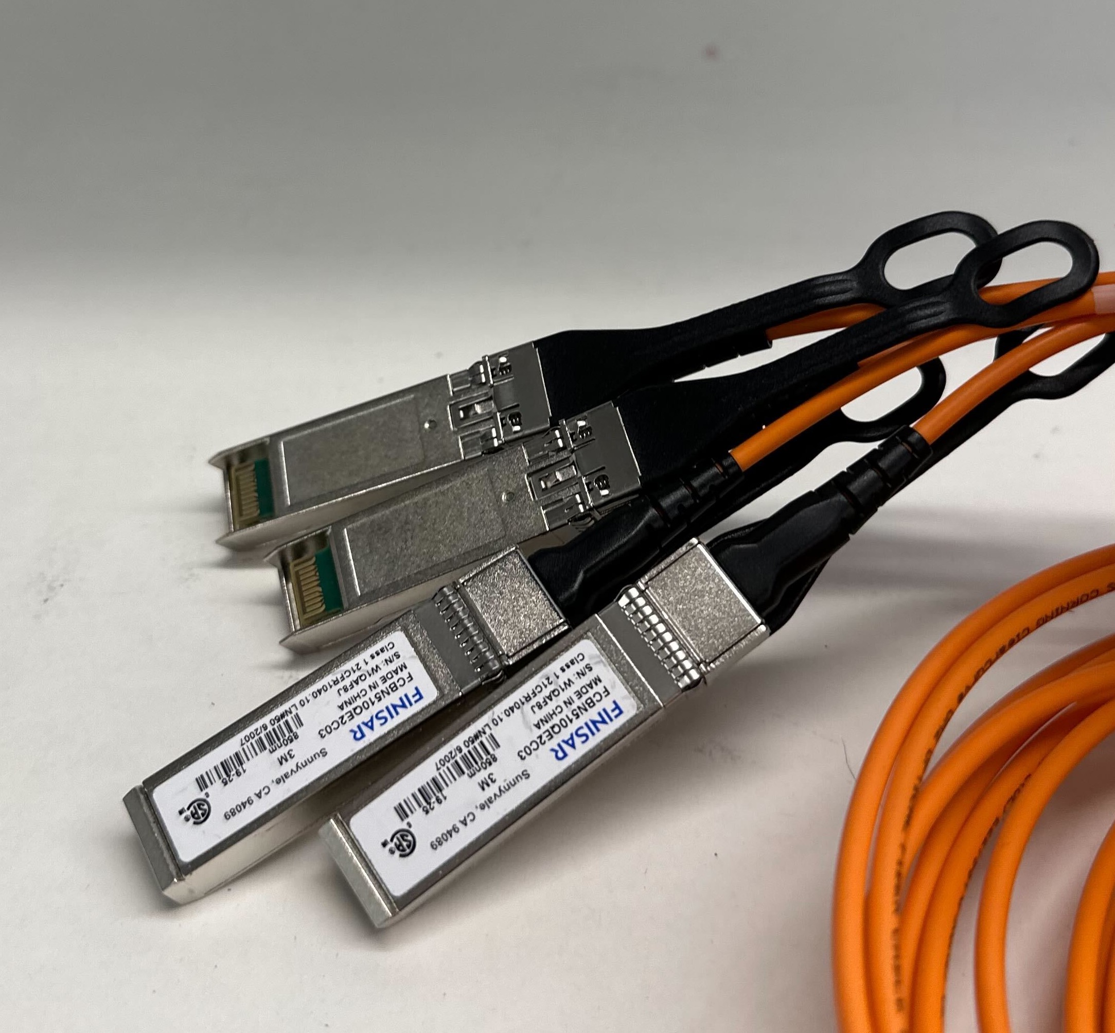 An image of a QSFP cable showing the 4 breakout cables.