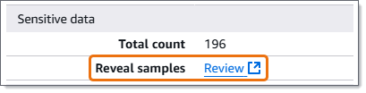 Il campo Reveal samples nel pannello dei dettagli del risultato. Il campo contiene un link denominato Review.