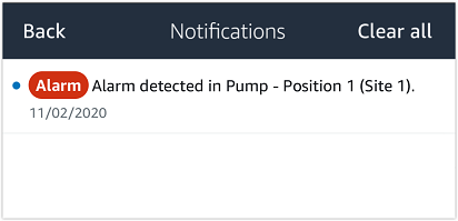 Notifications panel showing an alarm detected in Pump - Position 1 (Site 1) on 11/02/2020.