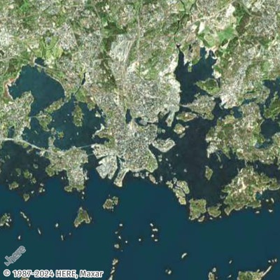 Aerial view of a coastal city with intricate waterways, islands, and urban development.